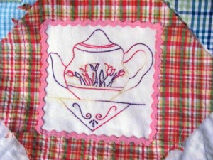 A patch on a teapot quilt made by P.J. 